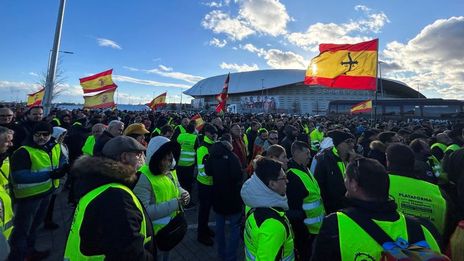 Spanish police scuffle with farmers, truck drivers on fifth day of protests